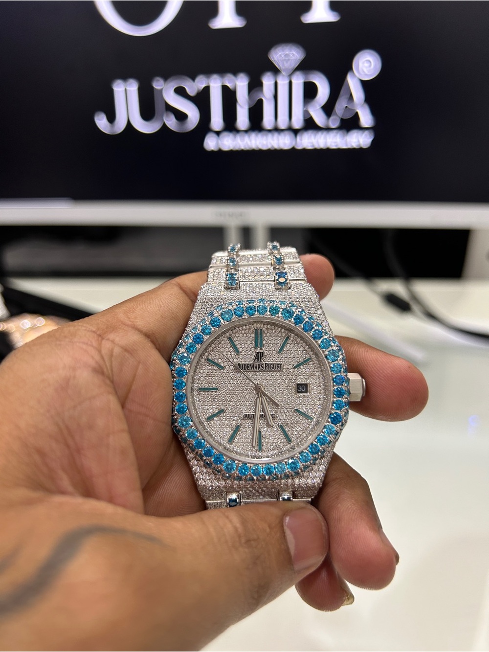 Audemars Piguet Silver Watch with Blue Accents